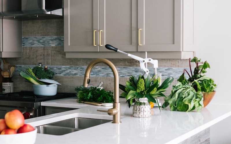 Clean and polished kitchen with bright countertops and cabinets